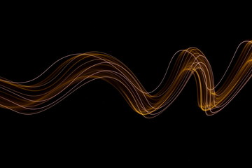 Long exposure photograph of metallic gold neon colour in an abstract swirl, parallel lines pattern...