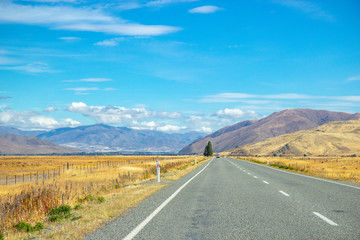asphalt road through Canterbury region of New Zealand