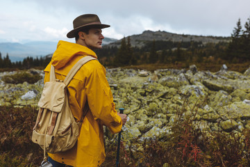 Naklejka premium serious man trying to predict weather forecast, close up photo. copy space.travel