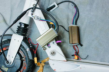 electric scooter repair, power controller replacement. © velimir