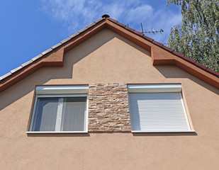 Facade of a family house with windows