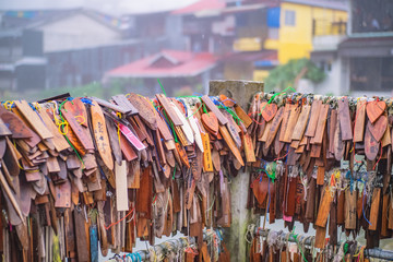 Kanchanaburi/Thailand-1 July 2017:Prayer tags tied on the bridge in the Pilok mine village in kanchanaburi City Thailand.Pilok mine The Old mine near the Thai-Myanmar border