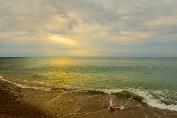 quiet sea beach at the pale dim day