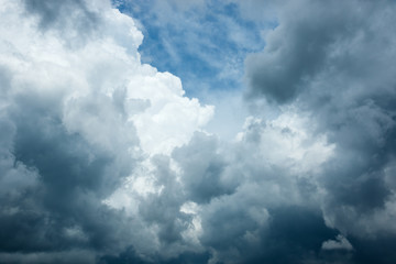 White Cloud and Black Storm Cloud On Sky