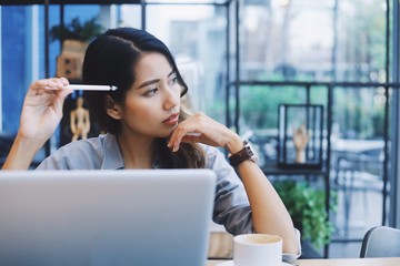 Fototapeta premium businesswoman talking on phone in her office