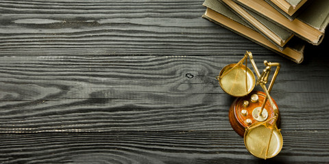 Law concept - Open law book with a wooden judges gavel on table in a courtroom or law enforcement office isolated on white background. Copy space for text.