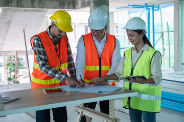 Engineers are discussing at building site