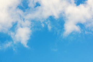 blue sky with light white clouds