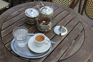 Espresso Set classic with three kinds of sugar on  wooden surface.