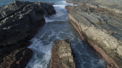 landscape and sunset on the coast contemplating the breaking of the waves on the cliffs