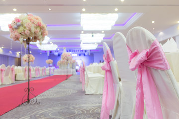 White chair with beautiful pink bows