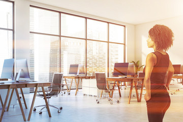 African American businesswoman in white office