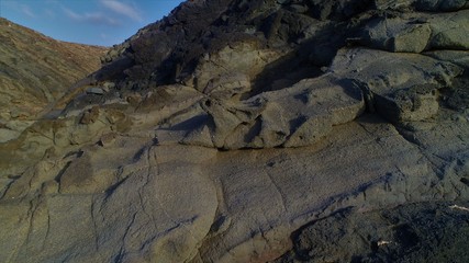 landscape and sunset on the coast contemplating the breaking of the waves on the cliffs