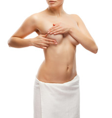 Woman examining breast isolated on white background