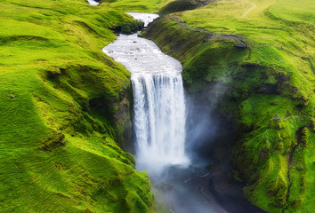 Aerial view on the Skogafoss waterfall in Iceland. Landscape from air. Famous place in Iceland....