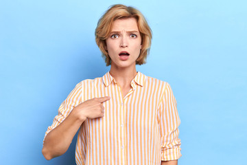 Closeup up portrait of unhappy , angry, annoyed young woman, asking question whats problem, you...