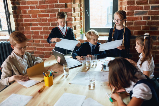 clever boss comparing two contracts, documents, close up photo