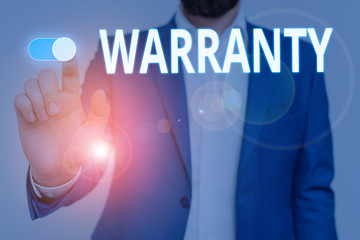 Conceptual hand writing showing Warranty. Concept meaning Free service of repair and maintenance of...