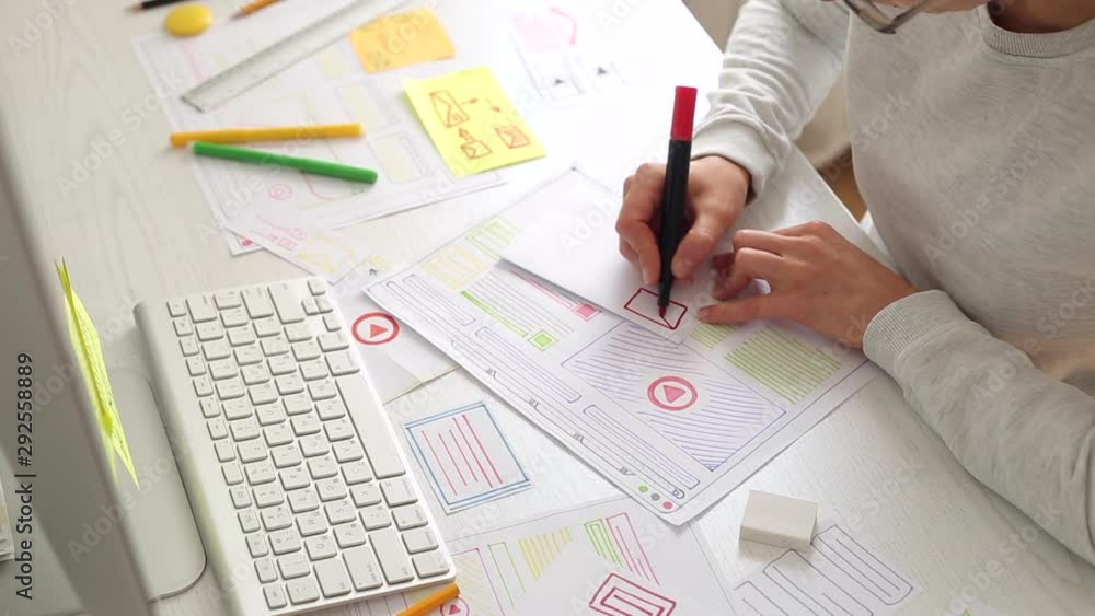 Poster designing web user interfaces for sites or web applications.