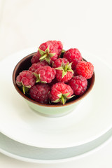 strawberries in bowl on white background