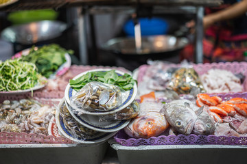 The market in Thailand is full of food,  street food, spicy, seafood, veggie.