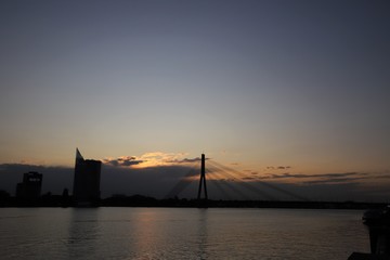 The Daugava river and the Vansu bridge in the twilight, Riga, Latvia