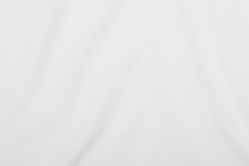 White fabric texture background with soft waves.