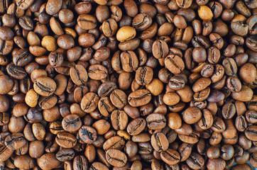 Roasted coffee beans close-up, can be used as a different background. Top view.