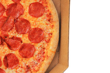 Pepperoni pizza in open pizza box. Fragment of tasty italian pizza in delivery card box, close up top view 