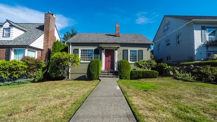 Small suburban home approach; 4k dolly shot