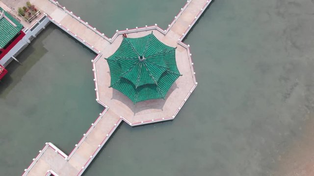 Aerial drone shot of Chinese Temple on Singapore southern Islands St. John Island and Kusu Island 