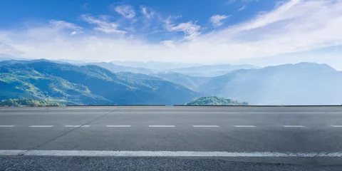 Zelfklevend Fotobehang Lege snelweg asfaltweg en prachtige hemel berglandschap © Naypong Studio