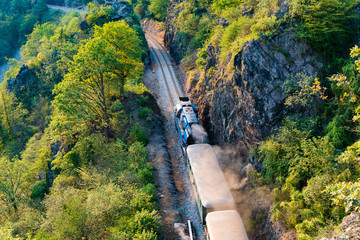 old steam train running through the valley
