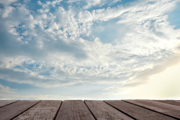 wooden floor and blue sky