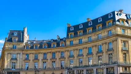 Fototapeta na wymiar Paris, France, beautiful buildings place des Victoires, typical parisian facades and windows