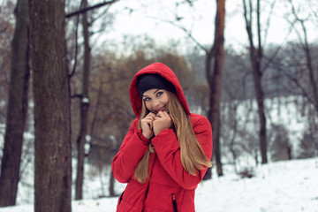 December walk with a young pretty blonde