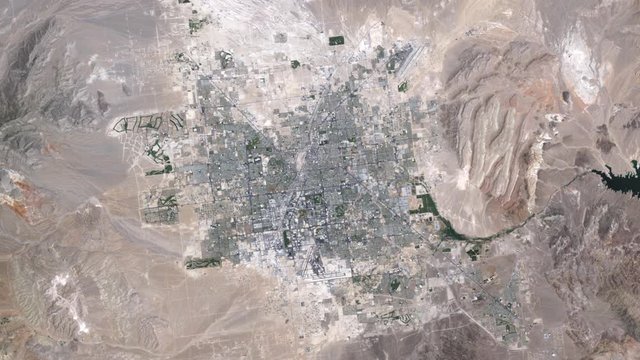 Las Vegas growth urban area and Mojave desert aerial satellite view animation. Contains public domain image by Nasa