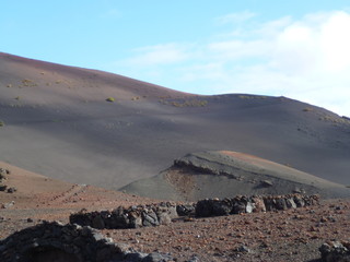 the volcanic rocky landscape in the mountains of the Timanfaya national park - Lanzarote island