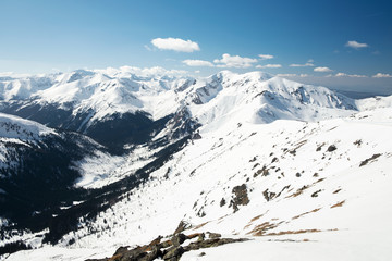 Winter landscape on Kasprowy Wierch mountain, beautiful view of other peaks in Tatra Mountains, near Zakopane