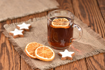 Cup of hot tea on winter evening for Christmas