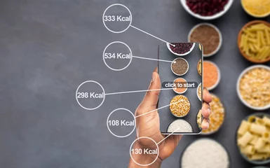 Foto op Plexiglas Cellphone counting amount of calories on photo of food © Prostock-studio