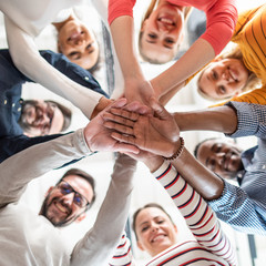 Stack of hands. Unity and teamwork concept.