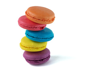 Sweet french macaroons cake on the white background.