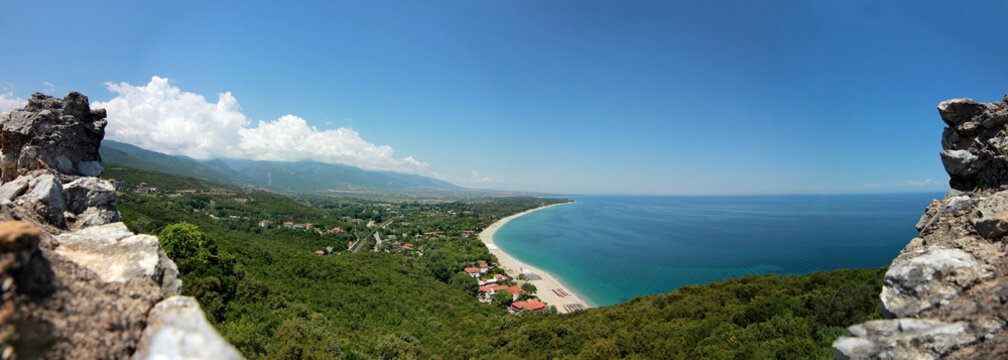Far view at greece coastline with beautiful blue sky