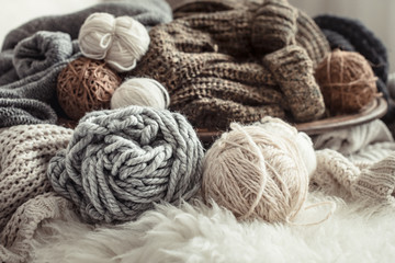 Fototapeta na wymiar Still life with a cozy variety of yarn for knitting.