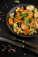 Fried chicken fillet with vegetables.