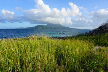 Day view of the Nevis Peak volcano across the water from St Kitts