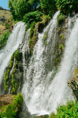 Natural waterfall. Scenery. Summer. Blue sky