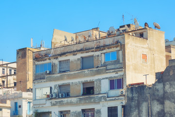 Old house in the center of Tunis, a dilapidated house with antennas in the capital Tunisia