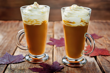 Pumpkin spice latte with whipped cream and cinnamon
